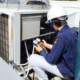 hvac technician setting up office automated climate control